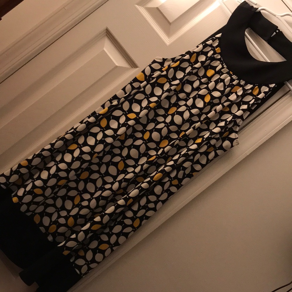 Cute black/white with a pop of yellow dress!